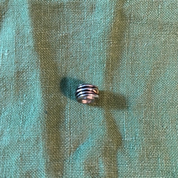 Pandora silver charm with gold accents, wrapped/stacked design, 1/4” x 1/2” - Picture 5 of 6